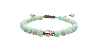 BEADED TURQUOISE PULL A BRACELET WITH AND SILVER SKULL DETAIL